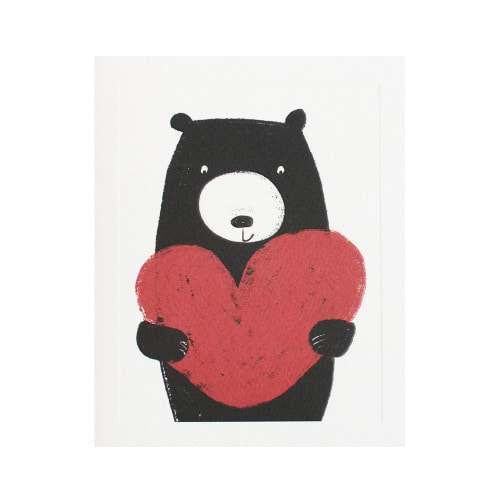 Bear holding heart